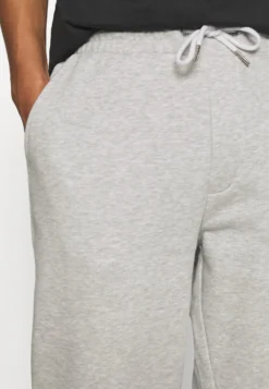 YOURTURN UNISEX - Spodnie Treningowe - Mottled Light Grey -Yourturn 00e4ed202f4b4a2b809328fabbbc2700 scaled