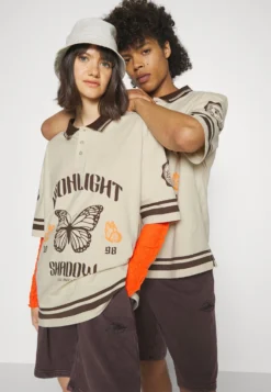 YOURTURN UNISEX - Koszulka Polo - Off-white -Yourturn 06f3f7fe8b914fa68eebd970da04ed85 scaled