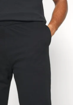 YOURTURN UNISEX - Spodnie Treningowe - Black -Yourturn 07c1b5cdab9b40debc97178217a47ad0 scaled