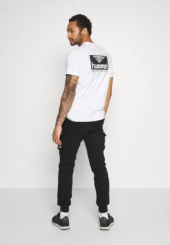 YOURTURN UNISEX - Spodnie Treningowe - Black -Yourturn 37e11c7cc85b4c32935b63421ffc599f scaled