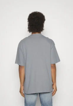 YOURTURN UNISEX - T-shirt Basic - Grey -Yourturn 5f2e9b0de6d54a9a982c53745dbb0fb1 scaled