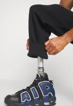 YOURTURN UNISEX - Spodnie Treningowe - Black -Yourturn 96890d6b49c24a0ca097867b183abe35 scaled