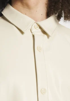 YOURTURN UNISEX - Kurtka Ze Skóry Ekologicznej - Beige -Yourturn a32ba3b97fb84e7fae95b9c061124838 scaled