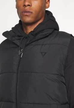 YOURTURN PUFFER VEST UNISEX - Kamizelka - Black -Yourturn c7204b97f3374a33a1d5f7b00355ca0e scaled