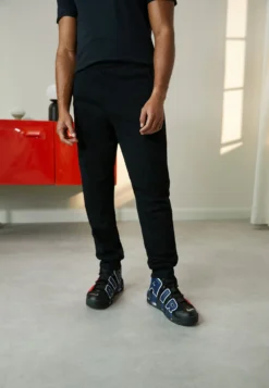 YOURTURN UNISEX - Spodnie Treningowe - Black